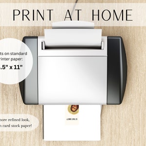 May include: A white printer with a black side panel is printing a white sheet of paper with a small image on it. The text "PRINT AT HOME" is at the top of the image. The text "Prints on standard printer paper: 8.5" x 11" for a more refined look, print on card stock paper!" is below the printer.