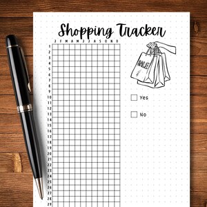 May include: A black and white printable shopping tracker with a grid for each month of the year. The tracker has a section for marking whether you shopped or not, with the words "Yes" and "No" next to checkboxes. A hand holding shopping bags with the word "SALE" on one of the bags is illustrated on the right side of the page.