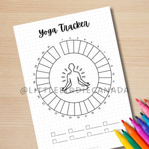 May include: A black and white printable yoga tracker with a circle divided into 31 sections. The center of the circle features a line drawing of a person in a yoga pose. The text "Yoga Tracker" is at the top of the page.
