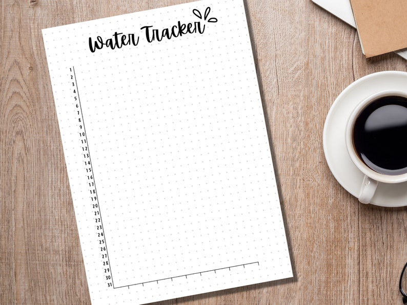 May include: A white printable water tracker with a black dotted grid and the text "Water Tracker" at the top.