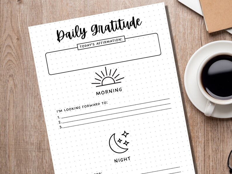 May include: A printable daily gratitude journal with a black and white design. The journal includes sections for "Today's Affirmation", "Morning", and "Night".