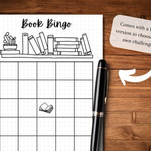 May include: Black and white "Book Bingo" printable sheet with a bookshelf illustration. The sheet includes a grid for marking off books read, a cactus, and the text "Comes with a blank version to choose your own challenge!"