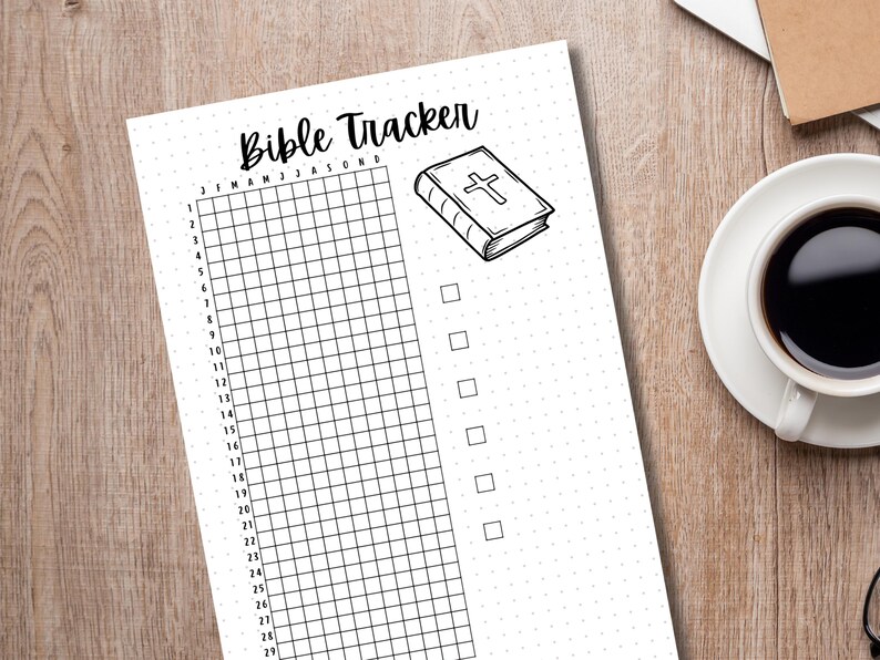 May include: A printable Bible tracker with a grid for each month of the year and a checklist for daily reading. The image includes a drawing of a closed Bible with a cross on the cover.