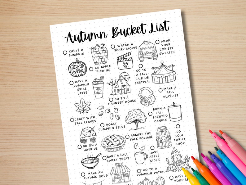May include: A printable autumn bucket list with a checklist of fall activities, including carving a pumpkin, going apple picking, watching a scary movie, going to a haunted house, and having a bonfire. The list is illustrated with cute drawings of pumpkins, apples, a haunted house, a bonfire, and other fall-themed items.