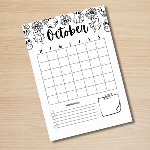 May include: A printable October calendar with a spooky theme. The calendar features a black and white illustration of ghosts and other Halloween-themed imagery. The calendar has space for writing in dates and notes.