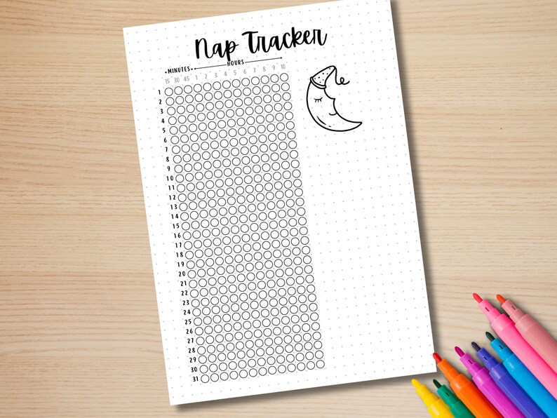 May include: A white Nap Tracker sheet with a dotted grid and a cartoon moon illustration. The sheet includes columns for hours and rows for minutes, with a space to track naps. Colorful markers are visible in the corner.