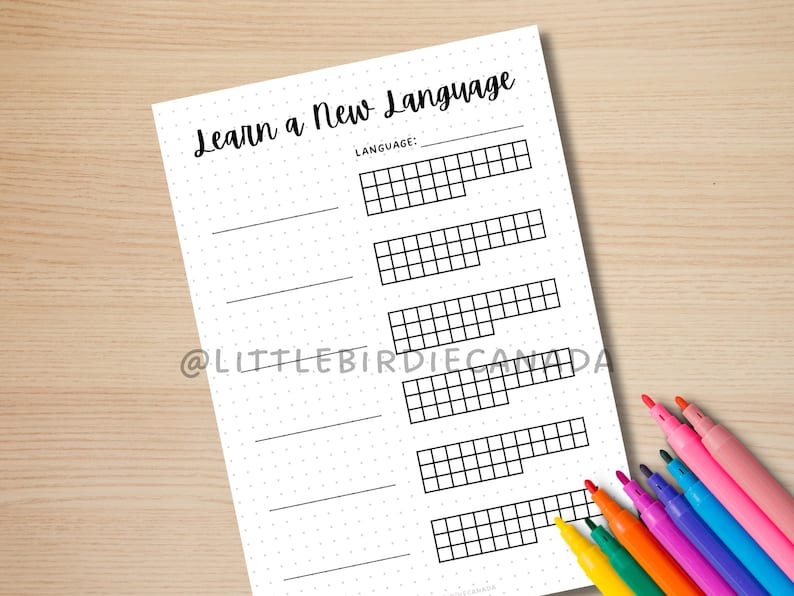 May include: Printable worksheet with the text "Learn a New Language" and a section to write the language name. The worksheet has a dotted background and five rows of blank squares for tracking progress.
