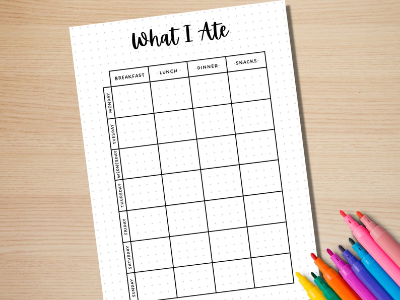 May include: A printable weekly food journal with a black and white design. The journal is divided into sections for breakfast, lunch, dinner, and snacks. The days of the week are listed down the left side of the page.