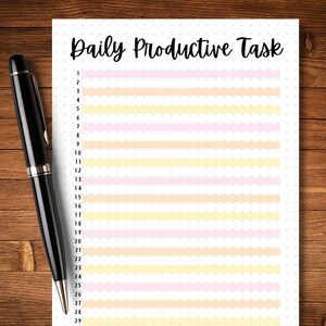 May include: A printable daily productive task list with numbered lines and alternating pink and yellow stripes. The list is on a white sheet of paper with a dotted background.