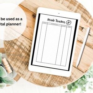 May include: A digital planner template on a tablet screen with the text "Grade Tracker A+" at the top. The template has columns for subject, assignment, due date, and grade.