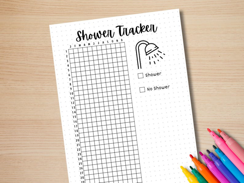 May include: A black and white printable shower tracker with a grid for each day of the month. The grid is labelled with the months of the year. There are checkboxes for "Shower" and "No Shower".