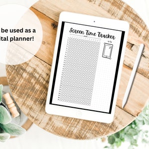 May include: A black and white digital planner on a wooden table with a stylus. The planner has a grid of circles and the text "Screen Time Tracker".