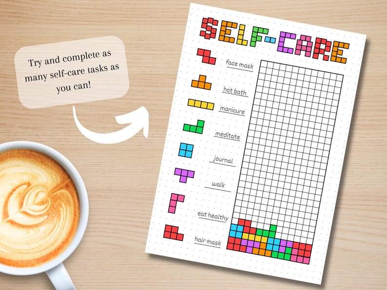 May include: A self-care checklist with the word "SELF-CARE" in pixelated letters. The checklist includes tasks like "face mask," "hot bath," and "meditate." A coffee cup with latte art sits on a wooden surface.
