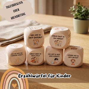 Könnte beinhalten: Ein Set aus fünf hellen Holzwürfeln mit deutschem Text und Kinderillustrationen. Der Text enthält Fragen wie 'Wem hast du heute geholfen?', 'Worauf freust du dich morgen?' und 'Was war heute der schönste Moment?'.