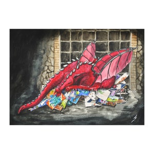 May include: A red dragon with pink wings is curled up on a pile of colorful papers and books. The dragon is in a dark room with a brick wall and a window behind it.