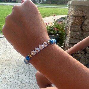 Blue and white clay bead bracelet