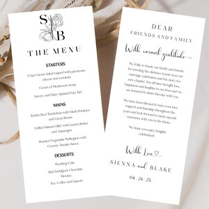 Peut inclure: Un menu de mariage avec un motif floral et le texte "The Menu" en haut. Le menu liste les entrées, les plats principaux, les desserts et le thé, le café et les liqueurs. Le menu comprend également un message aux amis et à la famille avec le texte "Dear Friends and Family, With warmest gratitude." et "With Love, Sienna and Blake, 04.24.2X."
