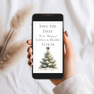 Może przedstawiać: Cyfrowa karta z zaproszeniem na ślub z białym tłem i złotą ramką. Tekst głosi "Save the Date" czarnym kolorem, a następnie "For the Wedding of Layla & Blake" i "12.14.24". Pod tekstem znajduje się śnieżna choinka z czarną kokardką.