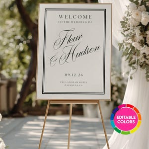Può includere: Un cartello di benvenuto per matrimoni rettangolare con una sottile cornice dorata, con testo nero che recita Welcome to the wedding of Fleur & Hudson, la data 09.12.26 e The Langham Hotel Pasadena CA, su un cavalletto a treppiede dorato.