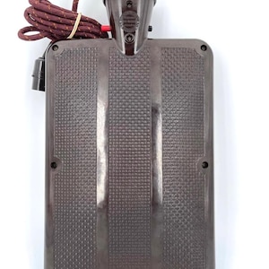 Bolsa de agua caliente eléctrica vintage rara de baquelita marrón, de fabricación británica, de la década de 1930.