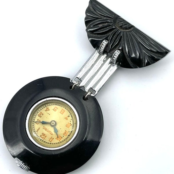 Très rare et magnifique broche montre en bakelite noire de style art deco, années 1930s, de la marque "Central"