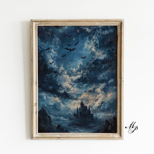 May include: A framed painting of a gothic castle under a night sky filled with stars, bats, and a crescent moon. The artwork uses shades of blue and white. The frame is a light gold colour.
