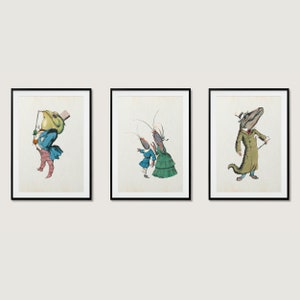 May include: Three framed illustrations of anthropomorphic animals wearing clothing. The first illustration features a green frog wearing a blue jacket and pink pants. The second illustration features a crayfish wearing a blue jacket and a green dress. The third illustration features an alligator wearing a green coat and a top hat.