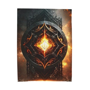 May include: A fiery, intricate, black and orange geometric design with a glowing diamond in the centre. The design is surrounded by a black frame with ornate details.