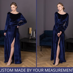 A woman in navy mother of bride dress.