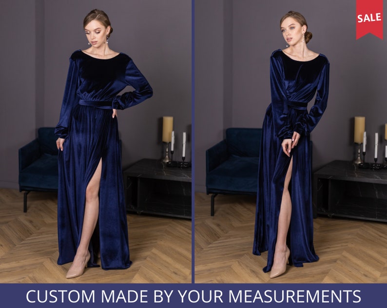 A woman in navy mother of bride dress.