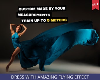 May include: A woman wearing a teal blue dress with a flowing skirt. The dress is custom made and can be made up to 5 metres long. The text "CUSTOM MADE BY YOUR MEASUREMENTS TRAIN UP TO 5 METERS" is displayed above the woman. The text "DRESS WITH AMAZING FLYING EFFECT" is displayed below the woman. The word "SALE" is displayed in a red rectangle in the upper right corner of the image.