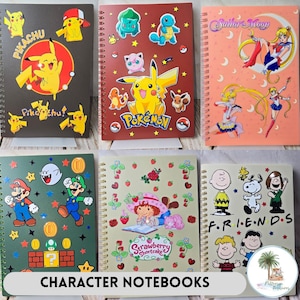 May include: A collection of character notebooks with spiral binding. Designs include Pikachu, Pokémon, Sailor Moon, Mario, Strawberry Shortcake, and Peanuts characters. The notebooks feature colorful illustrations and the text "CHARACTER NOTEBOOKS".
