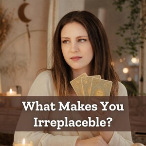 May include: A set of three rectangular tarot cards featuring gold celestial illustrations of a sun, moon, and stars. The cards are held in a hand, with the text "What Makes You Irreplaceable?" overlaid in white font across the bottom of the image.