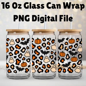 May include: Three clear 16 oz glass cans with bamboo lids and straws, featuring a repeating pattern of orange and black leopard spots, white ghosts, orange pumpkins, and black bats. The text 16 Oz Glass Can Wrap PNG Digital File is visible.