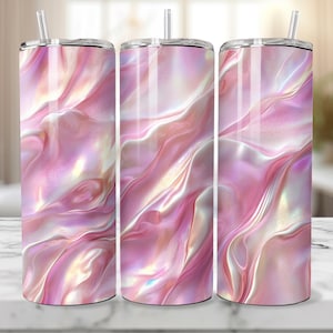 May include: Three stainless steel tumblers with a pink and iridescent marble pattern. The tumblers are all the same size and have a straw in each.