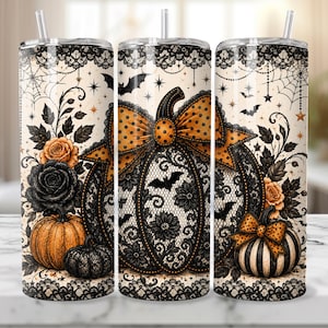 May include: A cylindrical tumbler with a straw featuring a Halloween-themed design of orange and black pumpkins, black lace patterns, floral accents, bats, and spiderwebs on a cream background. The design includes polka dot bows on the pumpkins.