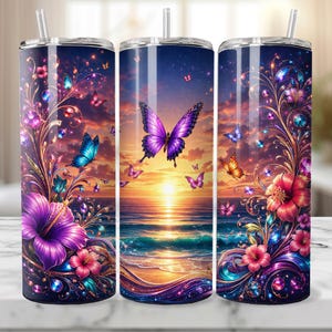 May include: A set of three stainless steel insulated tumblers with a vibrant design. The design features butterflies, flowers, and jewels against a sunset backdrop. Each tumbler has a straw and a lid.