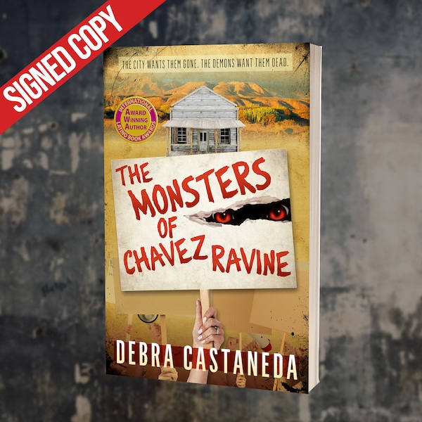 The Monsters of Chavez Ravine paperback signed by Debra Castaneda