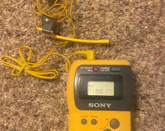 vintage Sony Walkman sports FM/AM model SRF-M70 - yellow