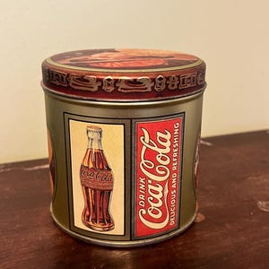 Coca Cola 1984 small tin by Bristol Ware 3.5in