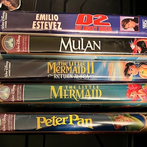 Walt Disney VHS collection. Peter Pan, the Little mermaid, the Little mermaid return to the sea, Mulan, D2 the Mighty Ducks.