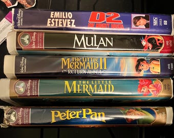 Collection Walt Disney VHS. Peter Pan, la petite sirène, la petite sirène retourne à la mer, Mulan, D2 les puissants canards.