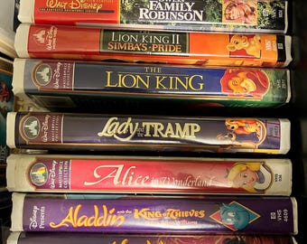 Walt Disney VHS collection. Mary Poppins, sleeping beauty, Swiss family Robinson, lion King, Alice in wonderland, Aladdin