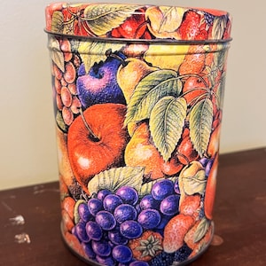 vintage round tin with fruit design 5.5 inch