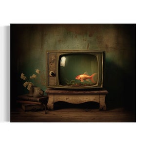 May include: A vintage television set with a wooden stand, displaying a goldfish swimming in a bowl of water. The television is set against a dark green wall with a small bouquet of white flowers in a vase on a stack of books.