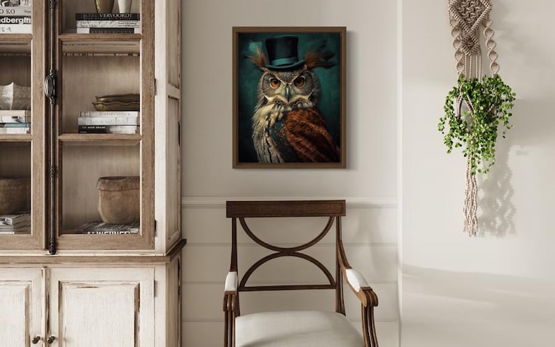May include: A framed print of an owl wearing a blue top hat with feathers. The owl is brown and gray with yellow eyes. The background is a dark green.
