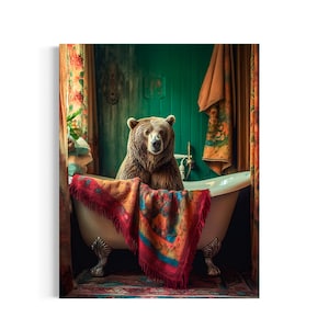 May include: A brown bear sits in a white bathtub with a colorful blanket draped over the edge. The bear is looking directly at the camera. The bathtub is in a bathroom with green walls and floral curtains.
