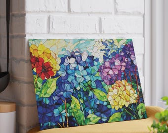 May include: A stained glass style painting depicting colourful hydrangeas. The flowers are in shades of blue, purple, yellow, and red. The background is a light blue with a hint of yellow.