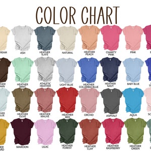 May include: Color chart showing 24 different t-shirt colors. The colors are arranged in four rows of six colors each. The colors include soft cream, ash, heather slate, natural, heather peach, charity pink, pink, berry, heather brown, heather mint, athletic heather, light blue, heather columbia blue, heather navy, baby blue, heather true royal, heather ice blue, heather olive, heather mauve, heather red, orchid, asphalt, aqua, soft pink, heather mustard, maroon, lilac, heather forest, heather clay, heather raspberry, heather green, and heather dusty blue.