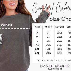 Op de afbeelding: Maattabel voor een Comfort Colors crewneck sweatshirt. De tabel toont de afmetingen in inches voor breedte, lengte en mouwlengte voor maten S tot en met 3XL.